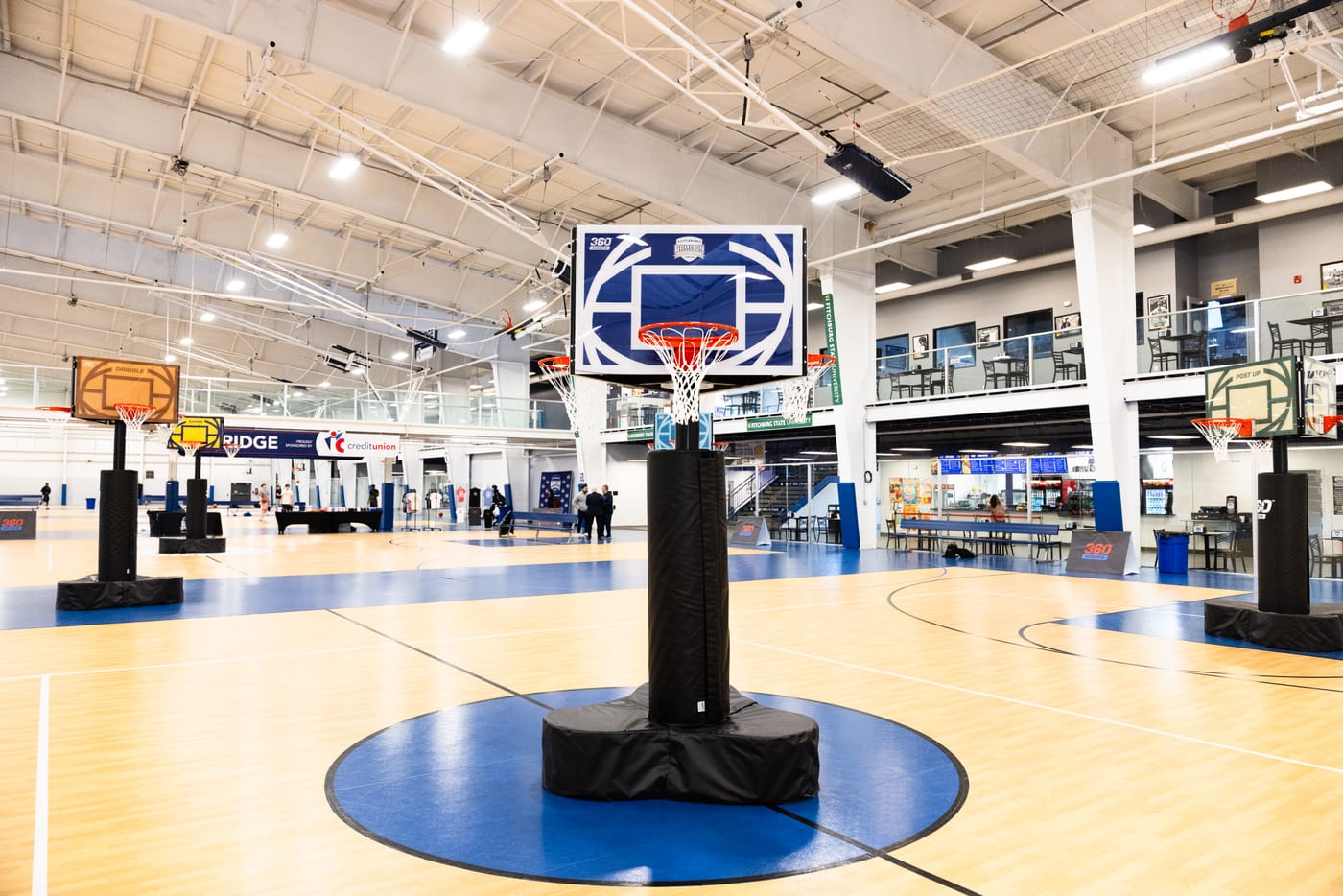 Custom-branded 360 Hoops system in a sports facility